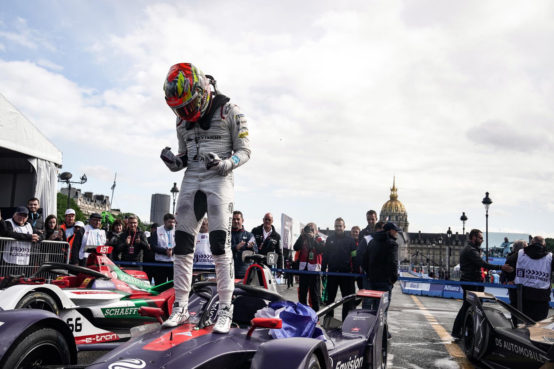 Robin-Frijns-stands-on-Formula-E-Car-Paris