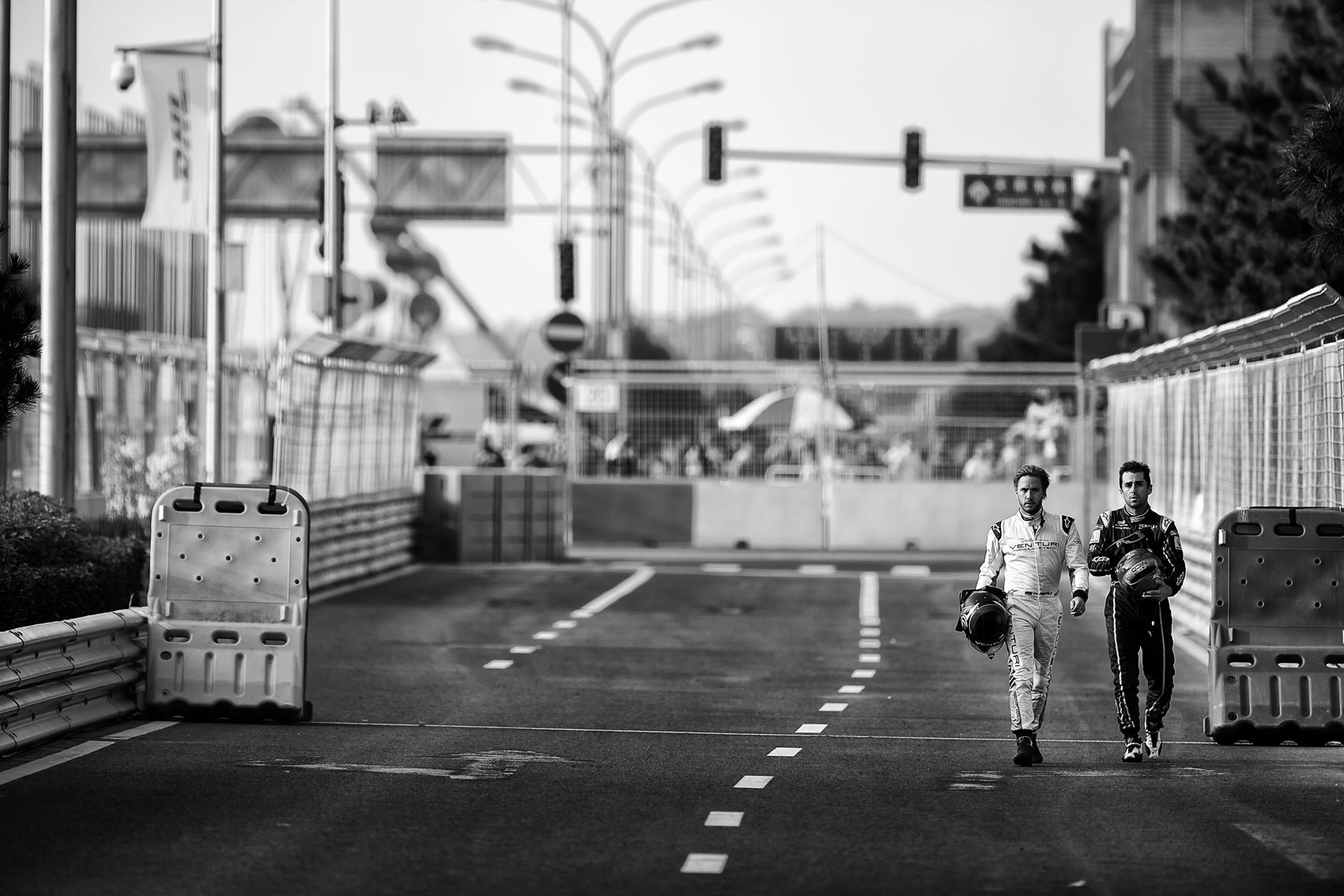 Heidfeld-Prost-Walk-Pitlane-Beijing-2014-Spacesuit-Media-Shivraj-Gohil