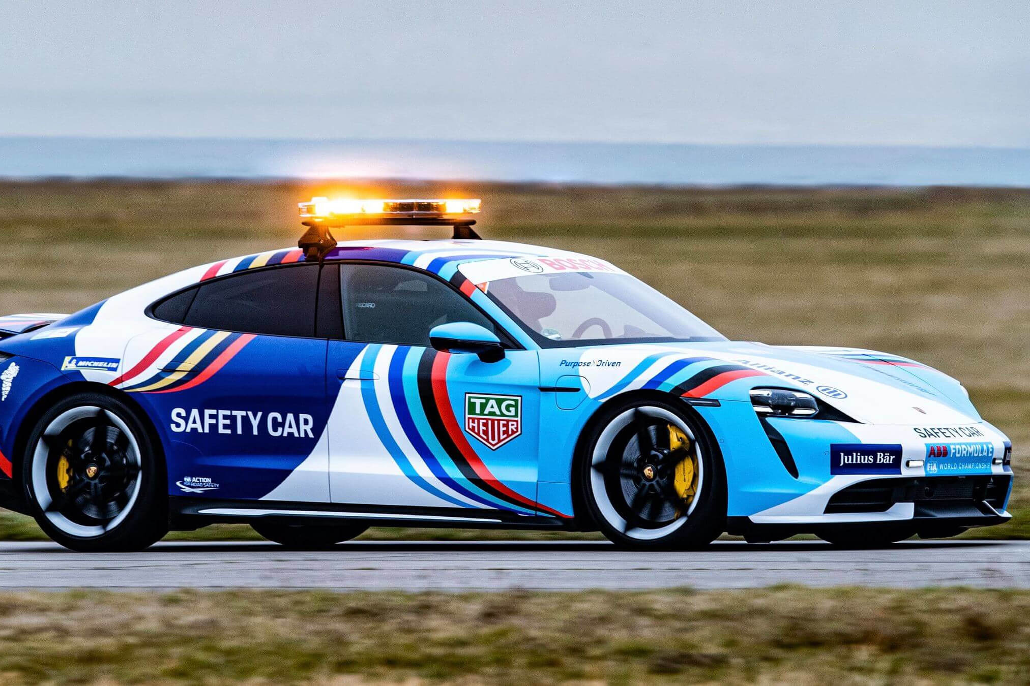 Porsche_Taycan_Safety-Car-side-view