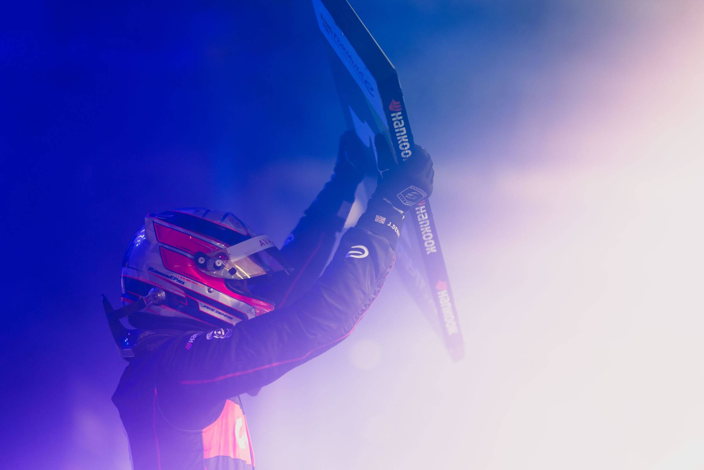 Jake-Dennis-holds-board-after-winning-Formula-E-title