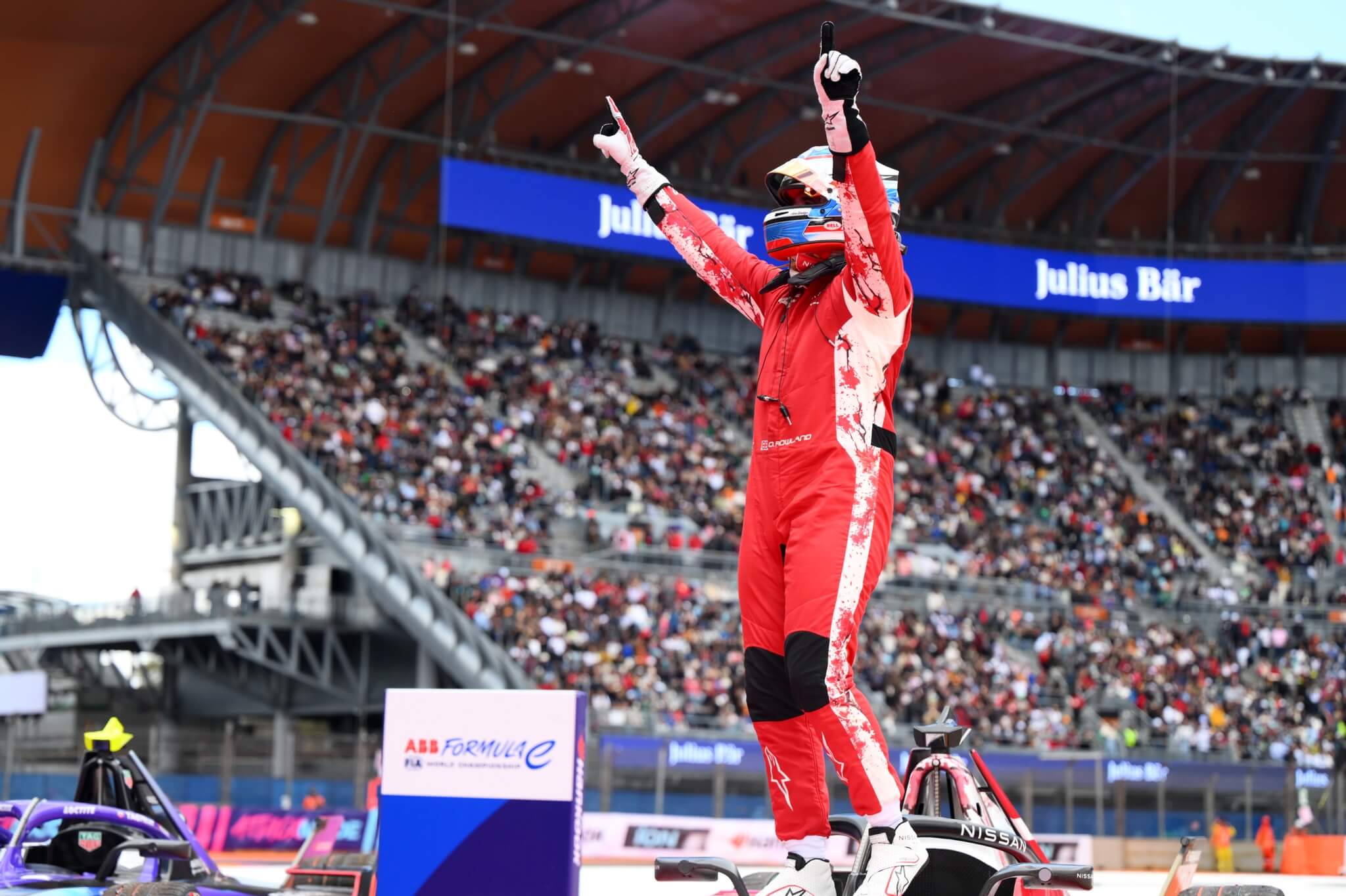 Rowland-Mexico-Winner-on-Car-in-Stadium