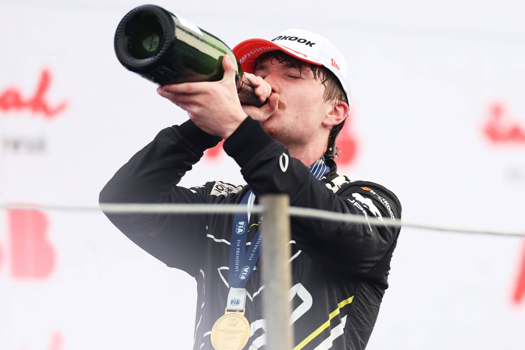 Ticktum-first-Formula-E-Win-Jakarta-Champagne