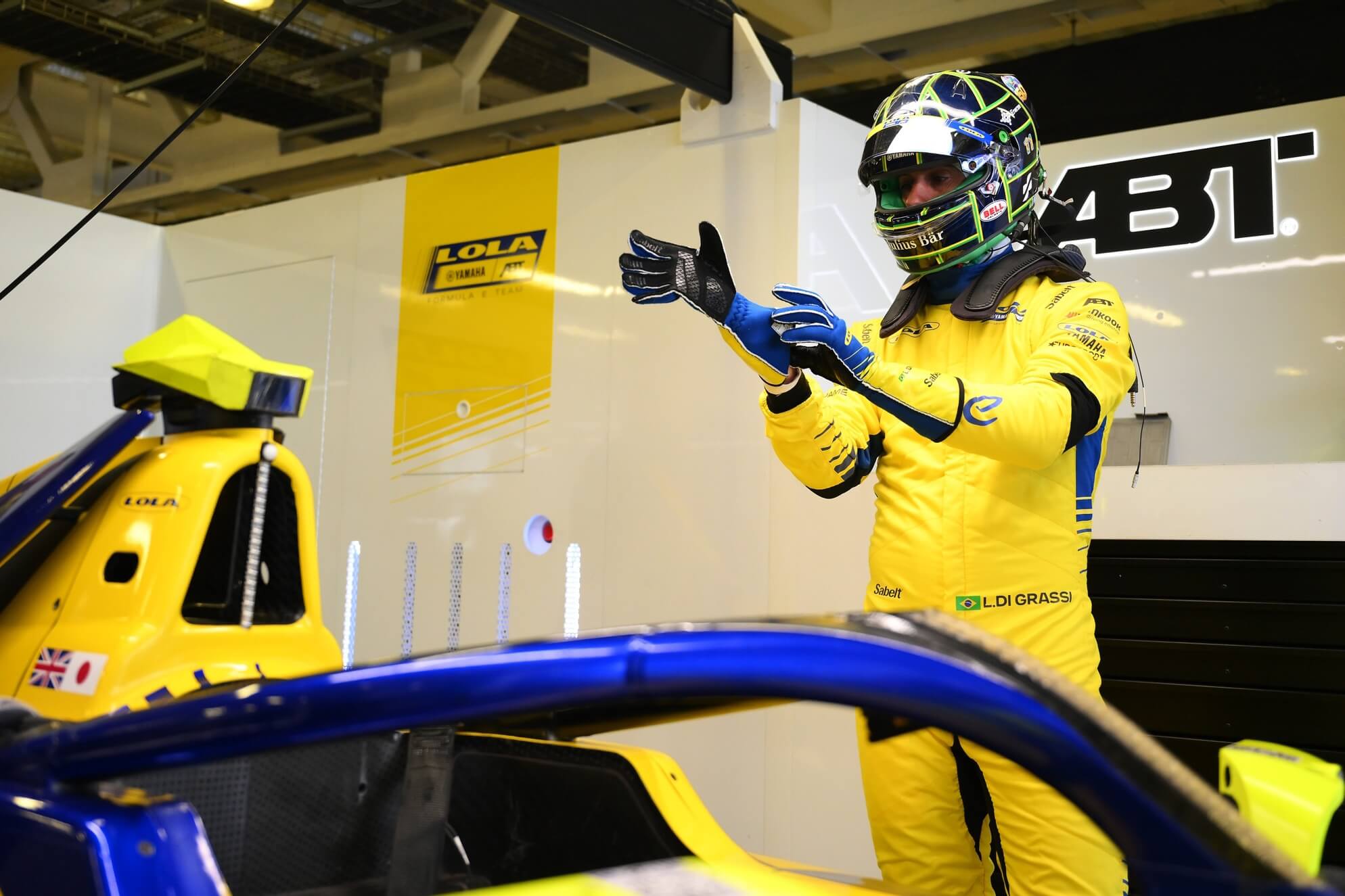 Lucas-di-Grassi-Lola-Yamaha-ABT-2026-Mexico-Garage-pulling-gloves-on