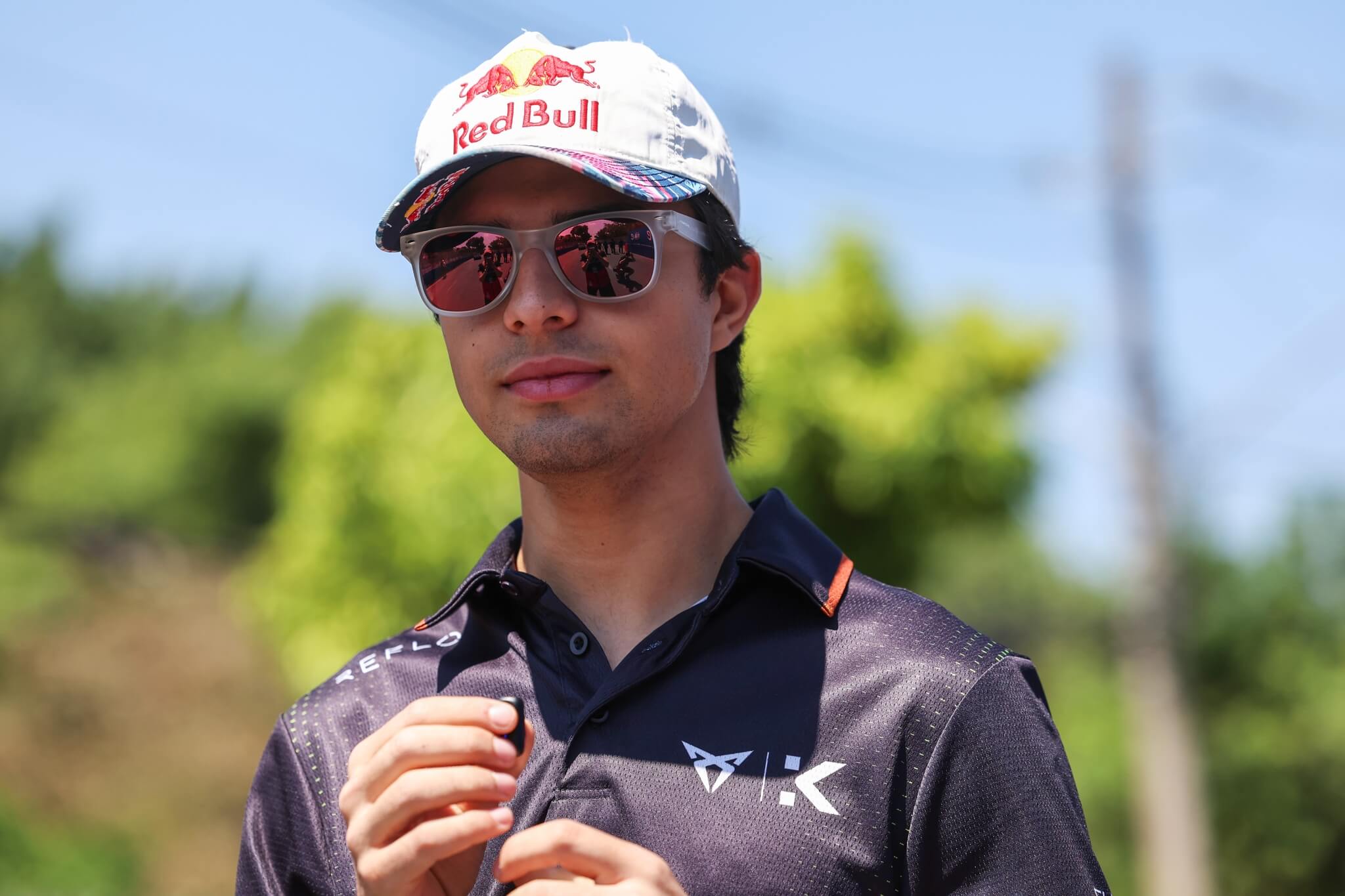 Pepe-Marti-Cupra-Kiro-2025-Sao-Paulo-E-Prix-track-walk-sun-glasses-red-bull-cap