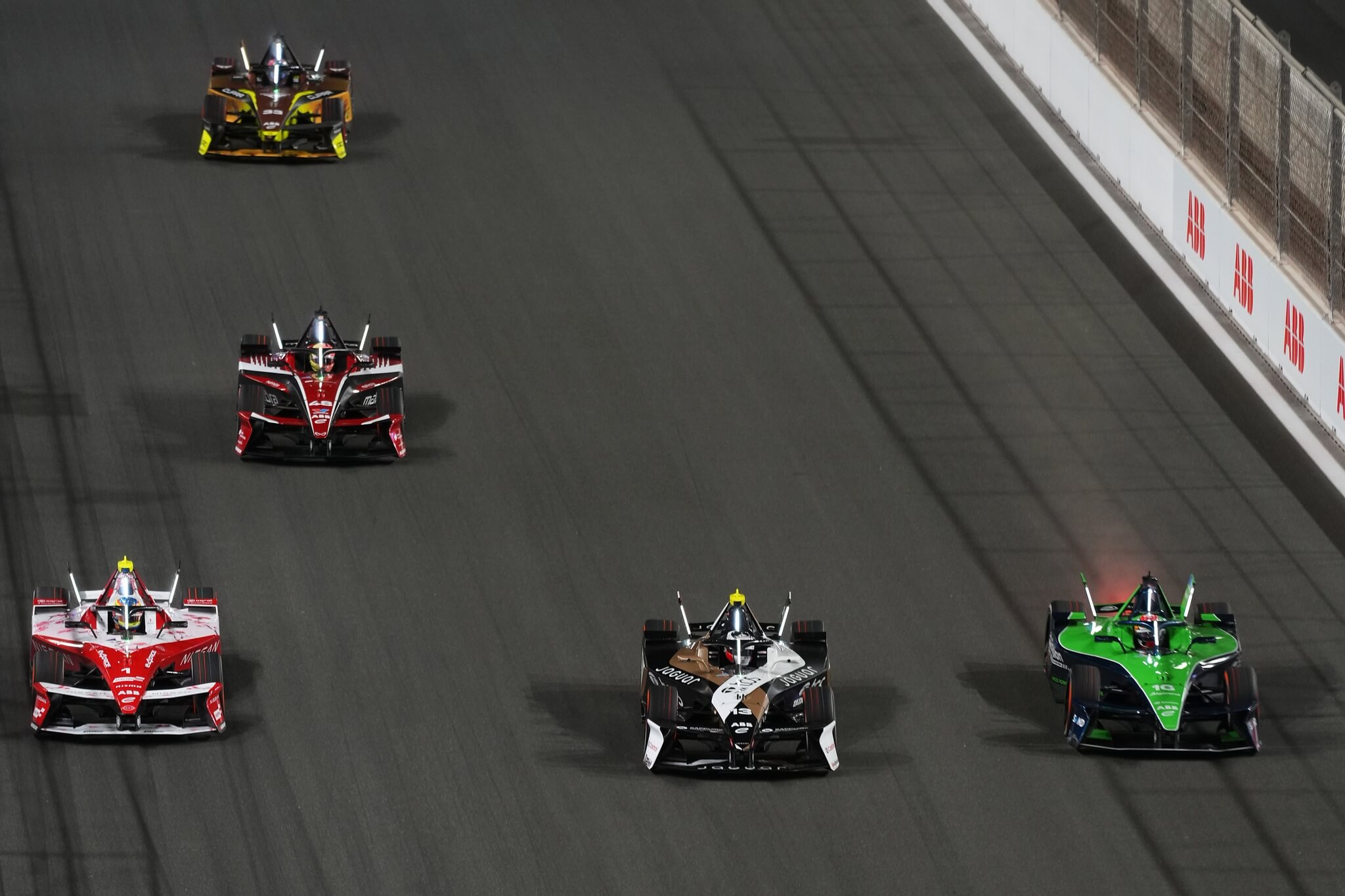 2026-Jeddah-E-Prix-cars-three-wide-Oliver-Rowland-NISMO-Antonio-Felix-da-Costa-Jaguar-Sebastien-Buemi-Envision