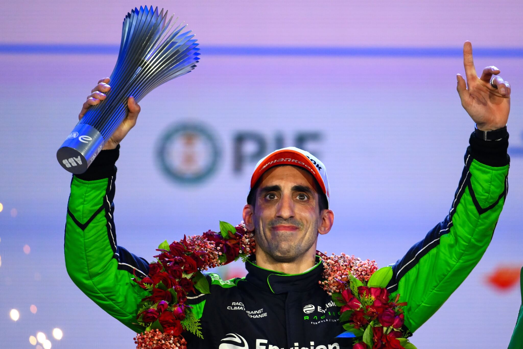 Sebastien-Buemi-Envision-2026-Jeddah-E-Prix-podium-with-trophy