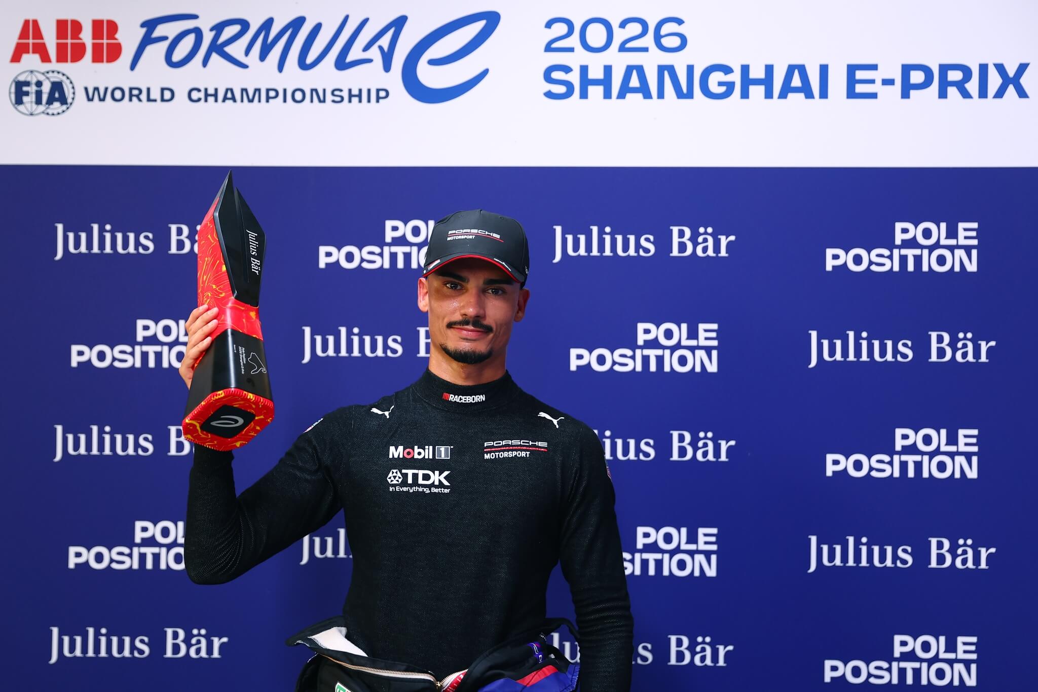 Pascal-Wehrlein-Porsche-2026-Shanghai-E-Prix-pole-position-holding-trophy