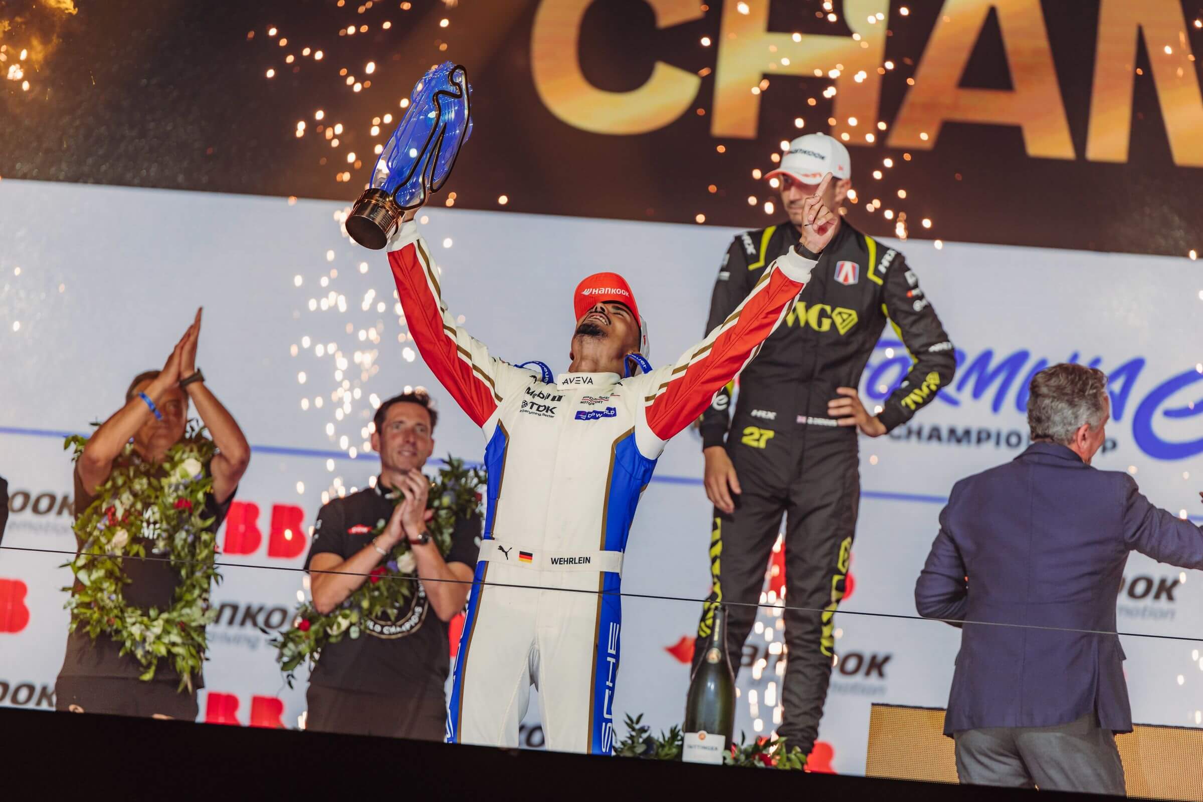 Pascal-Wehrlein-Porsche-London-Podium-championship-trophy